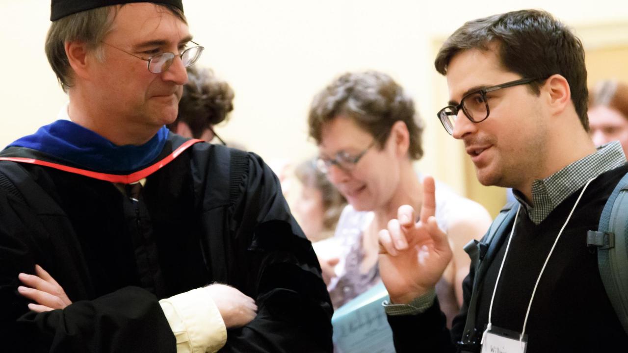 UC Davis University Honors Program Director Dave Furlow speaks with Dr. Tavernetti at the 2018 UHP Spring Banquet graduation ceremony. UC Davis University Honors Program Director Dave Furlow speaks with Dr. Tavernetti at the 2018 UHP Spring Banquet graduation ceremony.